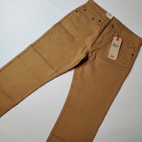 Levi's Men's Size 28X32 NWT 502 Regular Taper Jeans Low Rise Tan - Picture 1 of 9